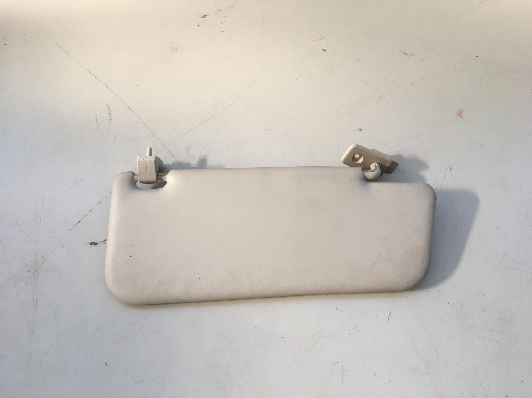 Aletta parasole parabrezza sx.